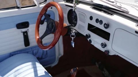 Vintage car interior with steering wheel and dashboard Stock Footage 303496107