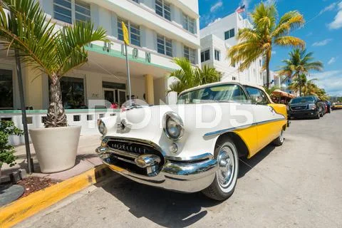 Vintage Car Parked At Ocean Drive In South Beach, Miami