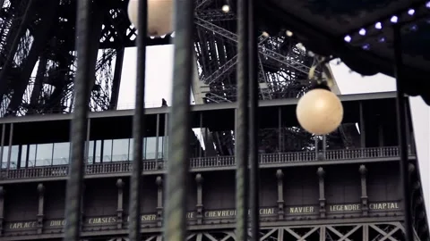 Vintage Carousel and Eiffel Tower in Paris, France. Low Angle View. Stock Footage 98989310
