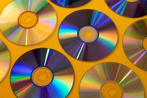 Vintage CD or DVD disk background, old circle discs used for data storage Foto stock
