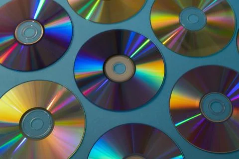 Vintage CD or DVD disk background, old circle discs used for data storage Stock Photos