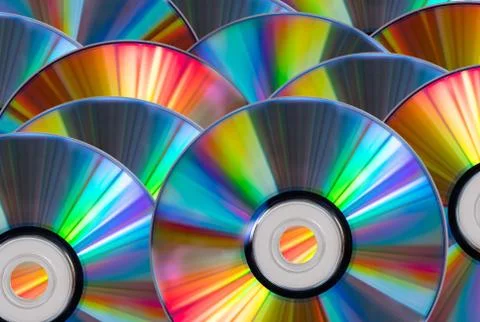 Vintage CD or DVD disk background, old circle discs used for data storage Stock Photos