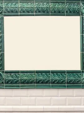 Vintage Ceramic Wall Frame with Leaf Pattern in Green Glaze Above White Sub.. Foto stock