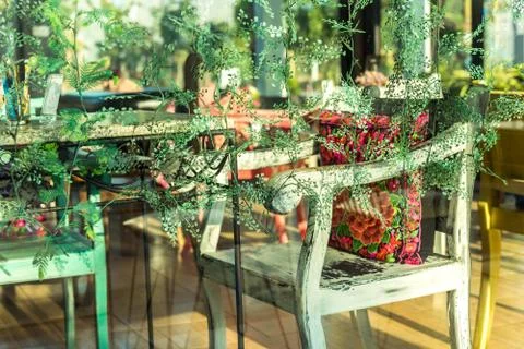 Vintage chairs in glass room Stock Photos