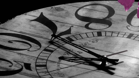 Vintage clock and flowing red rose petals Stock Footage 68036329