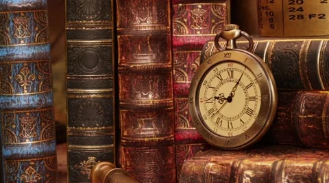 Vintage clock on a book Stock Footage 63137017