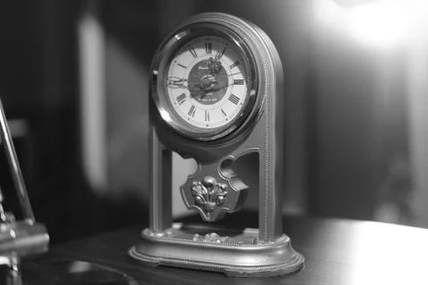 Vintage clock on the table close Stock Photos