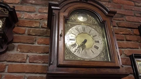Vintage Clock On Wall Angled Shot Stock Footage 241786171
