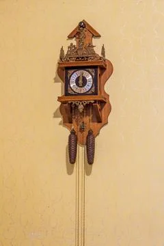 Vintage clock on a wall.. Stock Photos