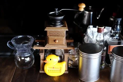 Vintage coffee drip machine set on counter bar in cafe Stock Photos