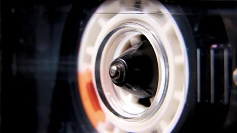 Vintage compact audio cassette playing.Macro shot Stock Footage 305913997