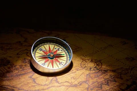 Vintage compass on an old paper map Stock Photos