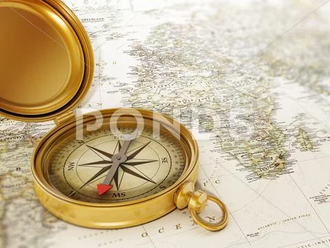 Vintage compass standing on old map: Graphic #61685489