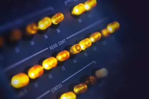 Vintage Computer Panel with Blinking Light Controls. Vintage Technology. 库存照片