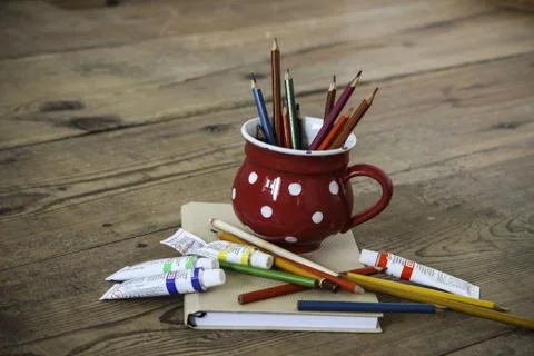 Vintage crayons in the red cup Stock Photos