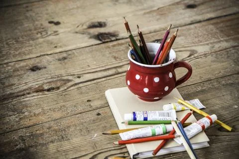 Vintage crayons in the red cup Stock Photos