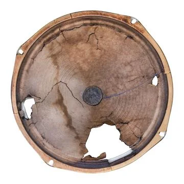Vintage damaged large full range speaker isolated on a white background Фото