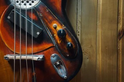Vintage design of an old four-string bass guitar 스톡 사진