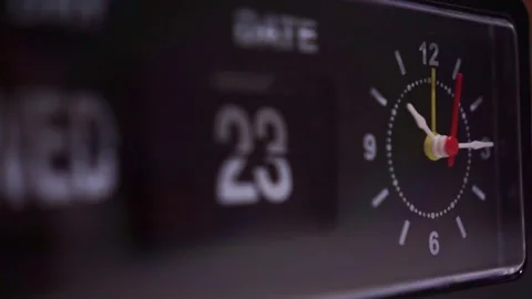 Vintage desk clock showing analog hands close up, retro flip display, nostalgic Stock Footage 345870868
