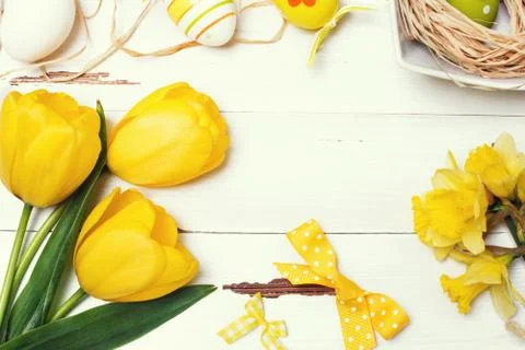 Vintage easter background with eggs and flowers Stock Photos