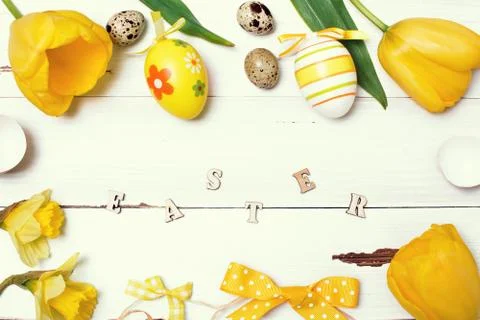 Vintage easter background with eggs and flowers Stock Photos
