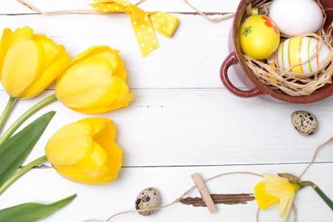 Vintage easter background with eggs and flowers Stock Photos