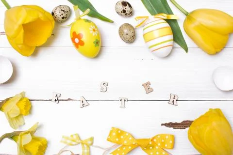 Vintage easter background with eggs and flowers Stock Photos