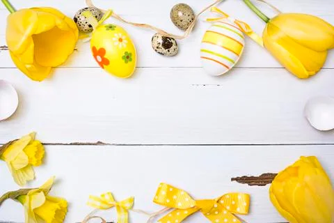 Vintage easter background with eggs and flowers Stock Photos