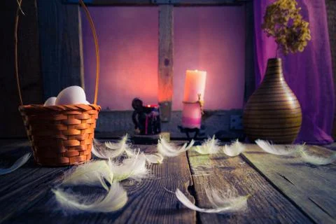 Vintage Easter basket eggs feathers Stock Photos