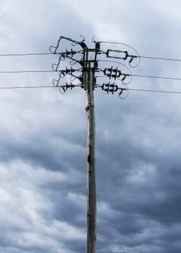 Vintage electric pole with dramatic clouds Stock Photos