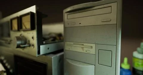 Vintage electronics on a cluttered workspace with dust and wear Stock Illustration
