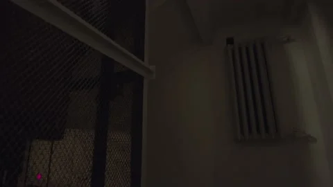 A vintage elevator is going up in a dark old building. Stock footage. View Stock Footage 152035514