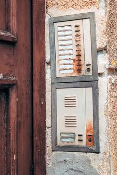 Vintage entry intercom system on an aged building facade. Concept of classi.. Stock Photos