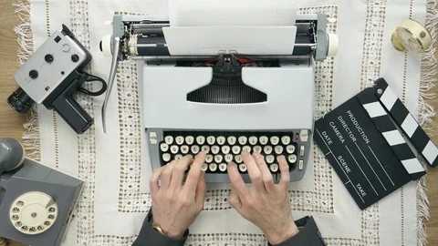 Vintage Filmmaker Typing on Typewriter Script Top View Stock Footage 108563609