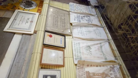 Vintage Flour packaging on the wall dated from 1950s. Vertical video. Stock Footage 236747337