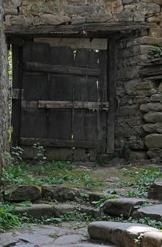 Vintage gate in monastery Stock Photos