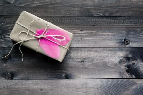 Vintage gift box on old wooden table Stock Photos