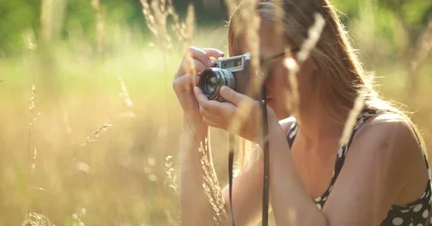 Vintage girl with camera in the fields Stock Footage 53124995