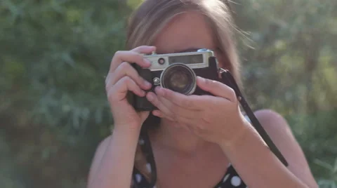 Vintage girl with camera in the fields Stock Footage 53230464