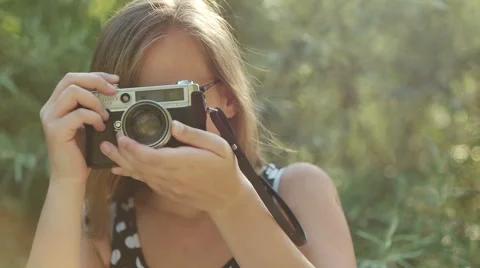 Vintage girl with camera in the fields Stock Footage 53712652