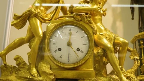 Vintage golden watch in Museum. A clock in gothic style made in Western Europe Stock Footage