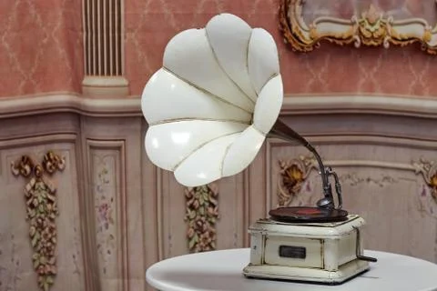 Vintage gramophone on a white table Stock Photos