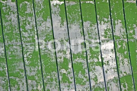 Vintage green metal roof surface, heritage material diversity. Stock Photos