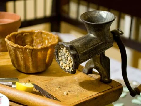 Vintage grinder on a kitchen table Stock Photos