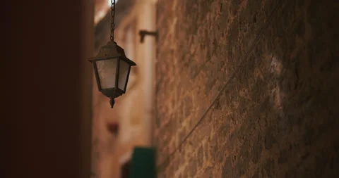 Vintage Hanging Lantern on Stone Wall Stock Footage 335347183