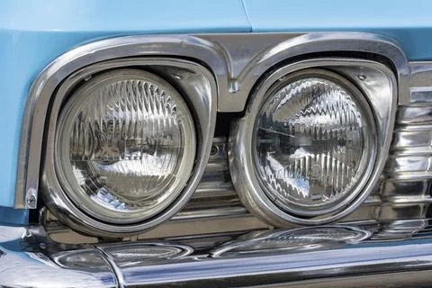Vintage Headlights of a blue old-timer Stock Photos