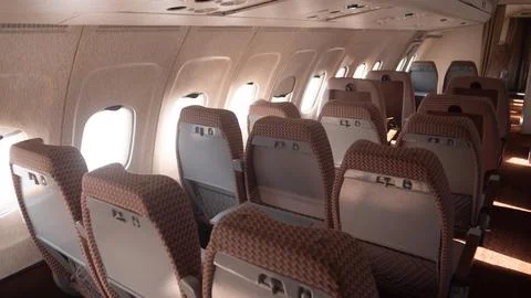 Vintage Interior of a Soviet-era Airplane Showcasing Empty Passenger Seats in a Stock Photos