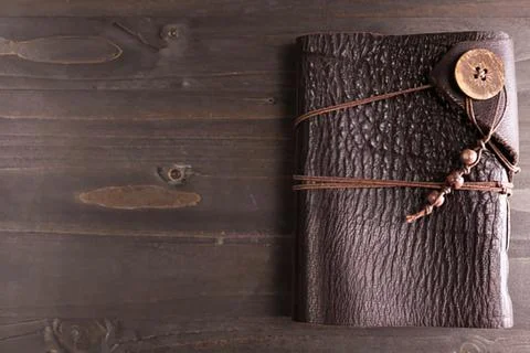 Vintage leather journal with brown string closure Stock Photos