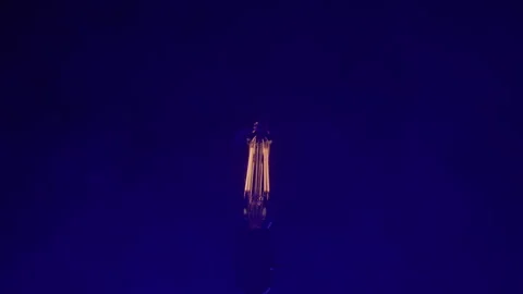 Vintage Light Bulb in a Dark Studio with Blue Lighting Stock Footage 222009169