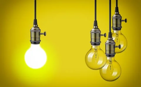 Vintage light bulbs on yellow background Stock Photos